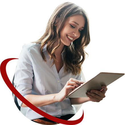 Smiling Young Woman Looking At Her iPad.